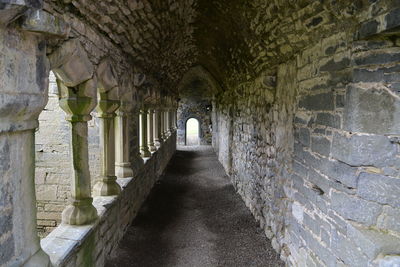 Narrow walkway along walls