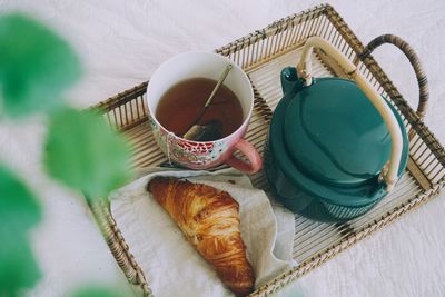 High angle view of breakfast on tray on bed at home