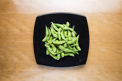 High angle view of chopped vegetables on cutting board