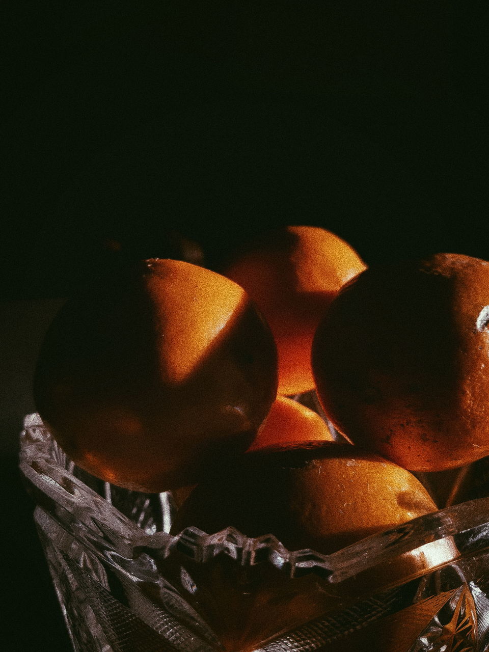 CLOSE-UP OF PUMPKIN ON TABLE AGAINST BRIGHT SUN