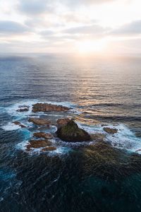 Scenic view of sea against sky during sunset