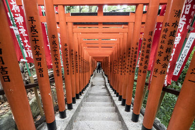 Narrow pathway along pillars