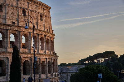 Historic building against sky during sunset