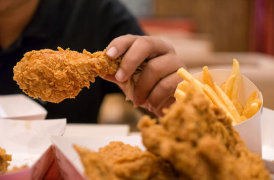 Close-up of hand holding food