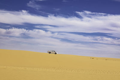 Scenic view of desert against sky