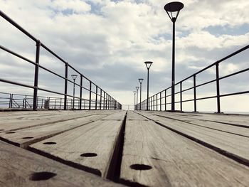 Surface level of bridge against sky