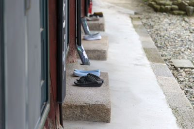 Close up of shoes at buddhism temple 