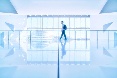 Full length of man walking against sky