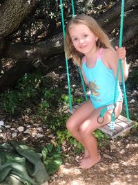 Portrait of smiling girl with plants