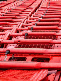 Red trolleys lined up
