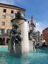 Fountain in front of building