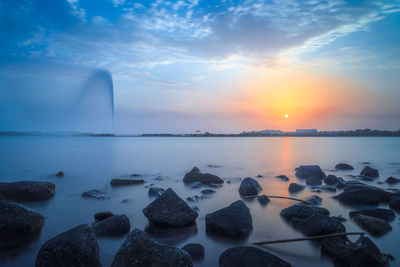 Scenic view of sea against sky during sunset