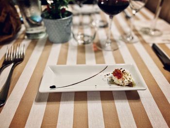 Glass of food on table in restaurant