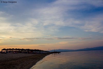 Scenic view of sea against sky at sunset