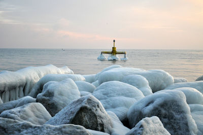 Scenic view of calm sea against sky