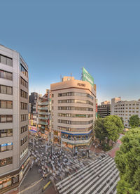 High angle view of buildings against clear sky