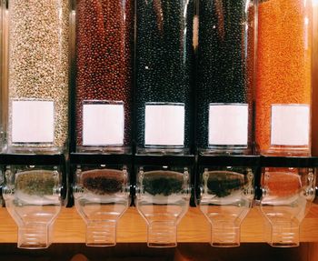 Various lentils in containers at store