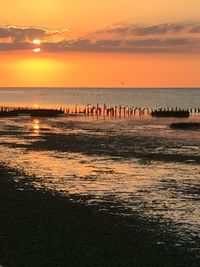 Scenic view of sunset over sea