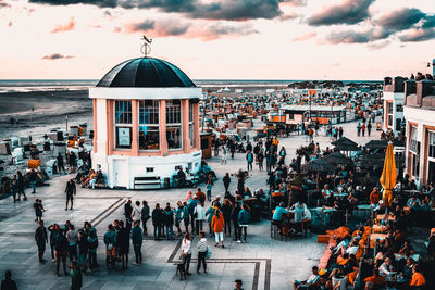 High angle view of people on street against buildings in city