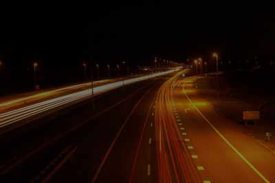 Light trails on road at night