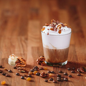 Close-up of chocolate coffee on wooden table