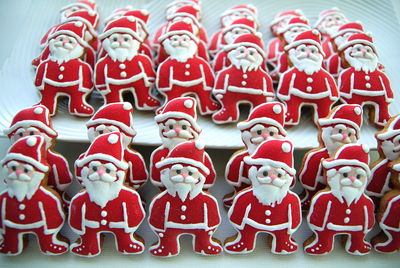 Close-up of santa claus shaped cookies on table