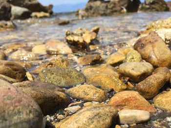 Close-up of pebbles on beach