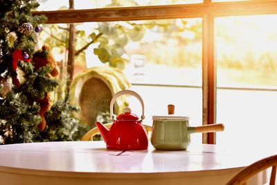 Close-up of tea served on table against window