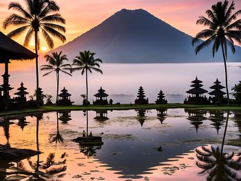 Scenic view of lake against sky during sunset