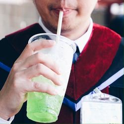 Cropped image of woman looking away
