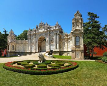 View of historical building in garden