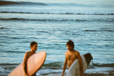 Moments at the beach in bali, indonesia. shot on 35mm kodak portra 800 film.