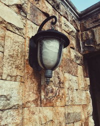 Low angle view of brick wall