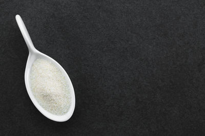 High angle view of ice cream against black background