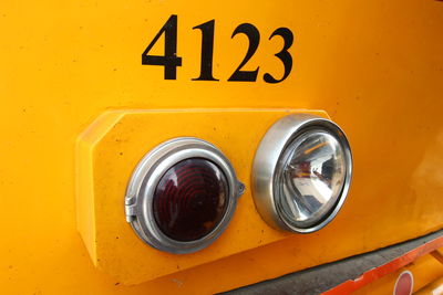 Close-up of yellow car