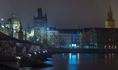 Prague, czech republic - december 30, 2016 night view of the charles bridge and surroundings