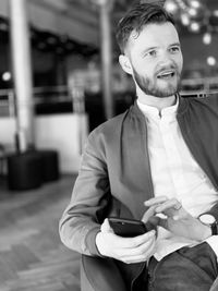 Young man using smart phone