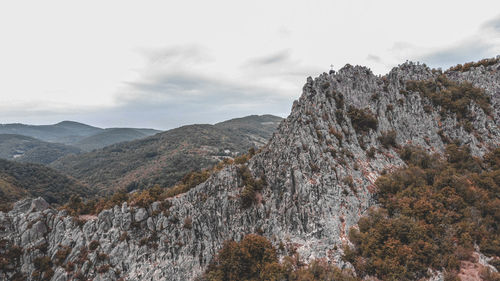 Scenic view of rocky mountains against sky