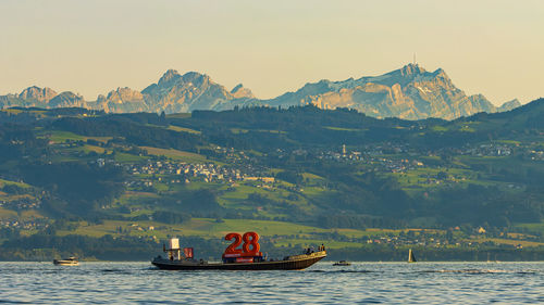 Boat in lake constance - under the montain säntis