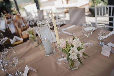 Flower vase on table at restaurant