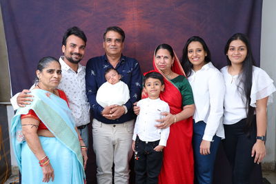 New born photo shoot with family, parents, grandparents and siblings