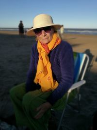 Portrait of woman standing on beach