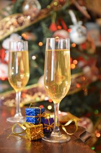 Close-up of champagne flutes on table