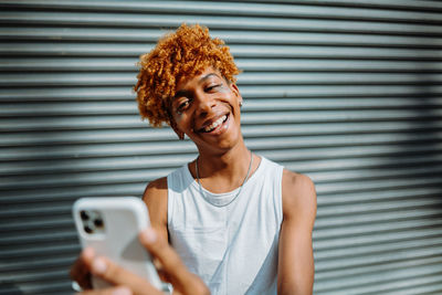 Young woman using mobile phone