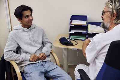 Doctor and patient in doctor's office