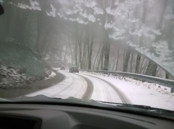 Road seen through car windshield
