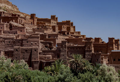 Traditional mud-built berber village. kasbahs in marrakech in the atlas mountains, morocco, africa.