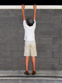 Low section of man standing on floor