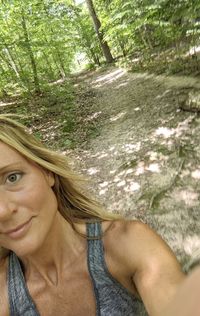 Portrait of woman in forest