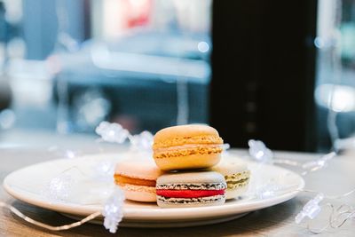 Close-up of macaroons in plate on table